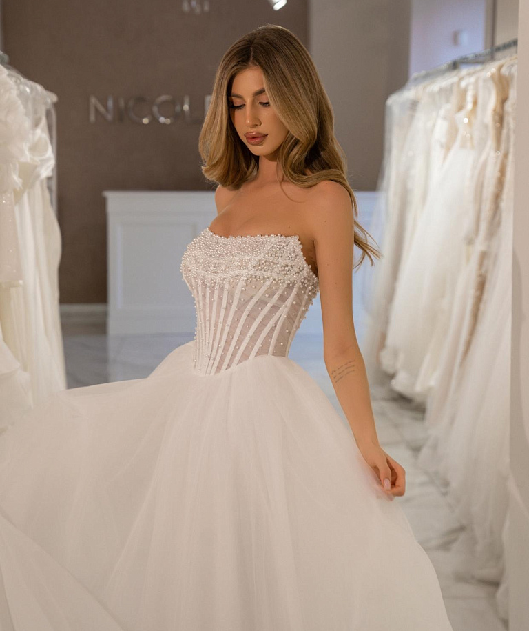 Свадебное платье расшитое жемчужинами